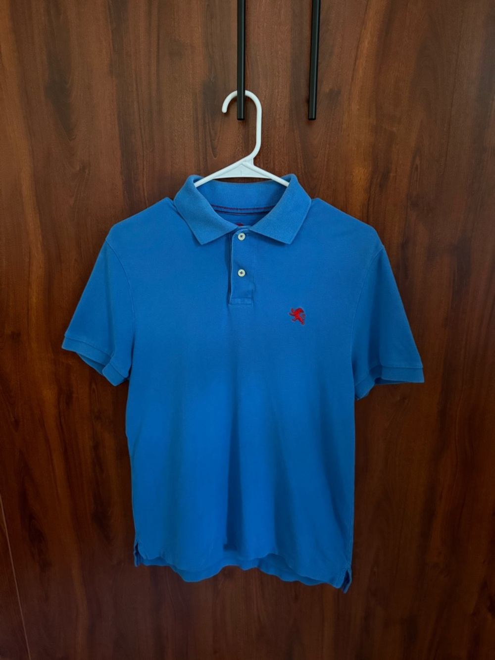 Express Small Lion Polo: Bright Blue Polo with Red Logo